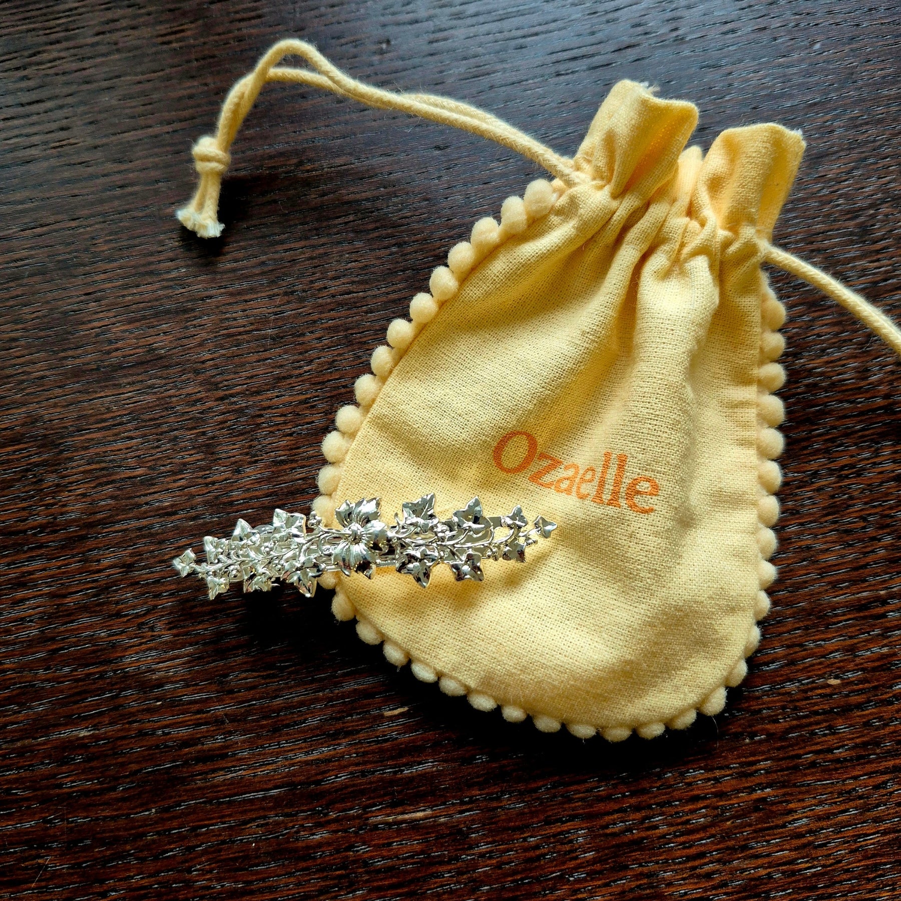 Small golden Calliope hair clip