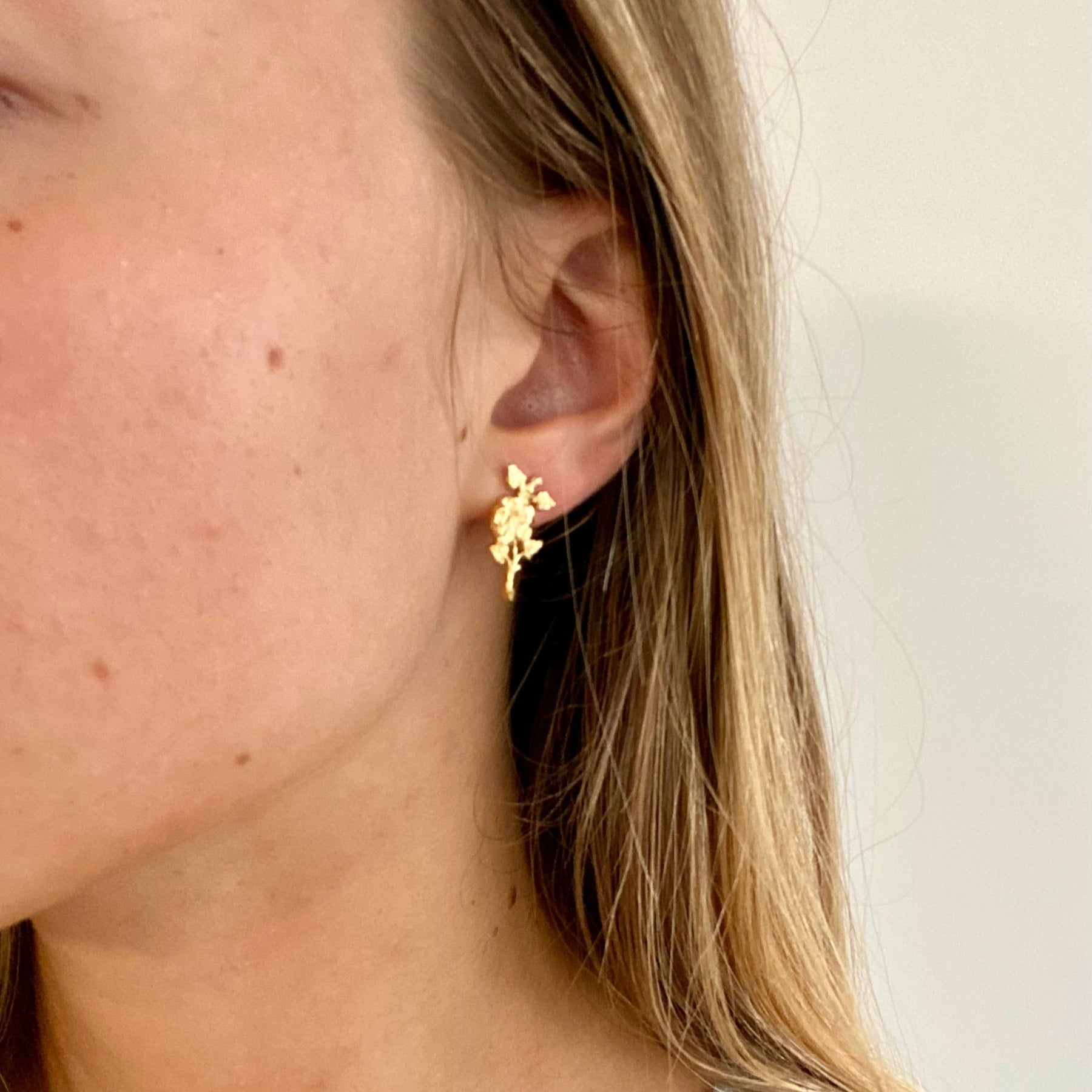 Livia flower gold stud earrings